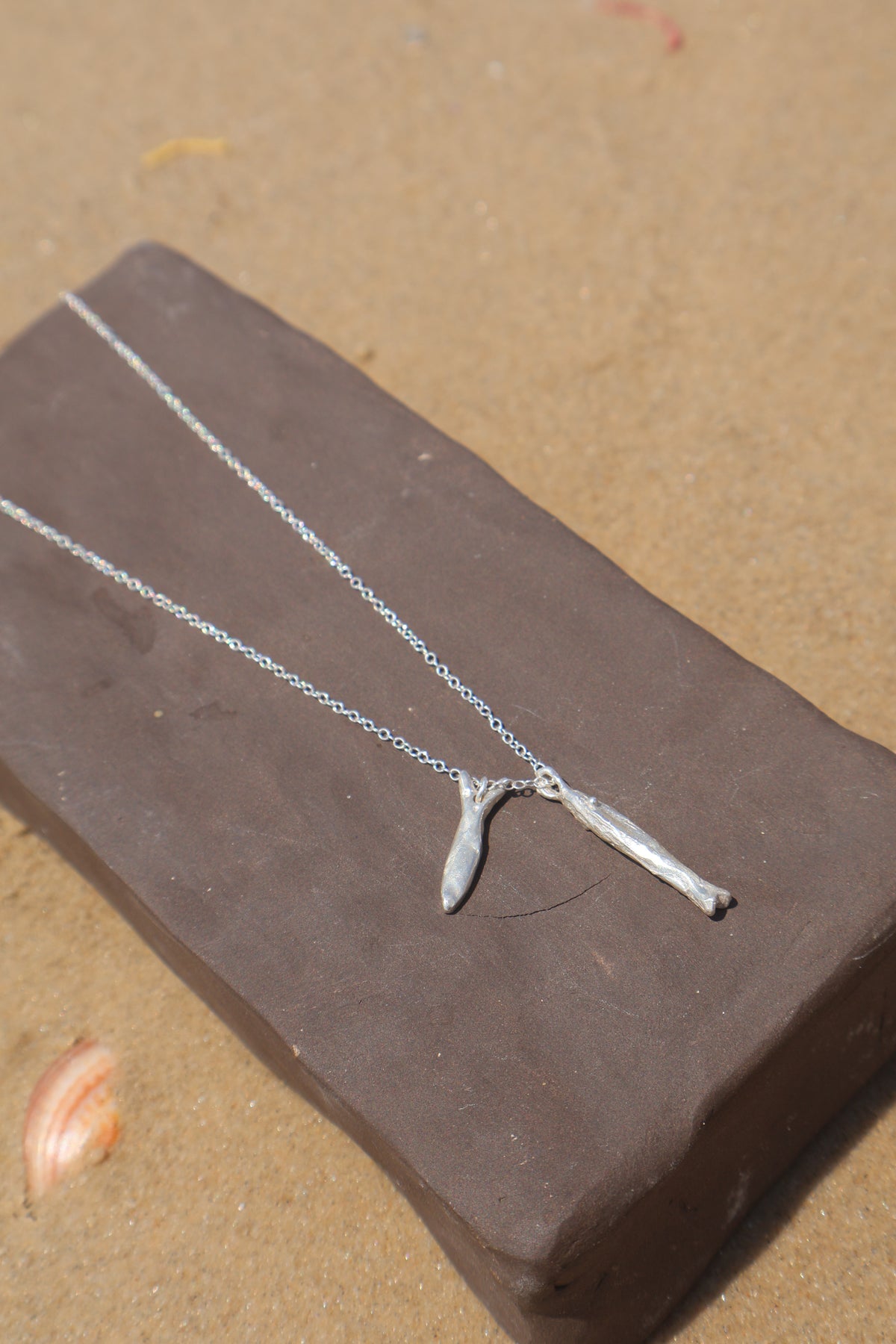 Double fish necklace