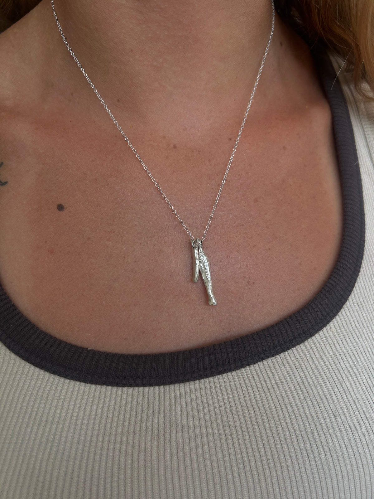Double fish necklace