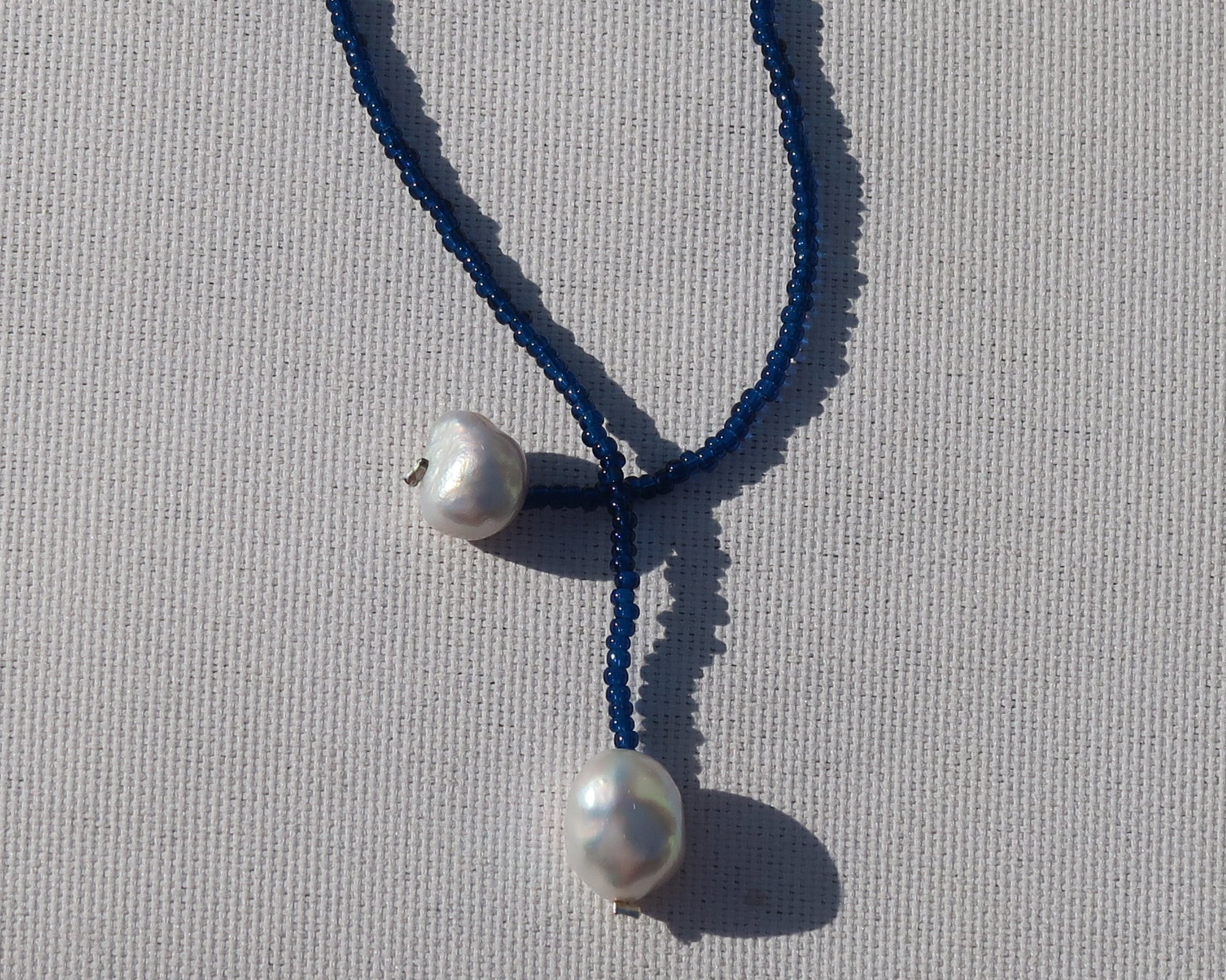 Blue and pearl necklace