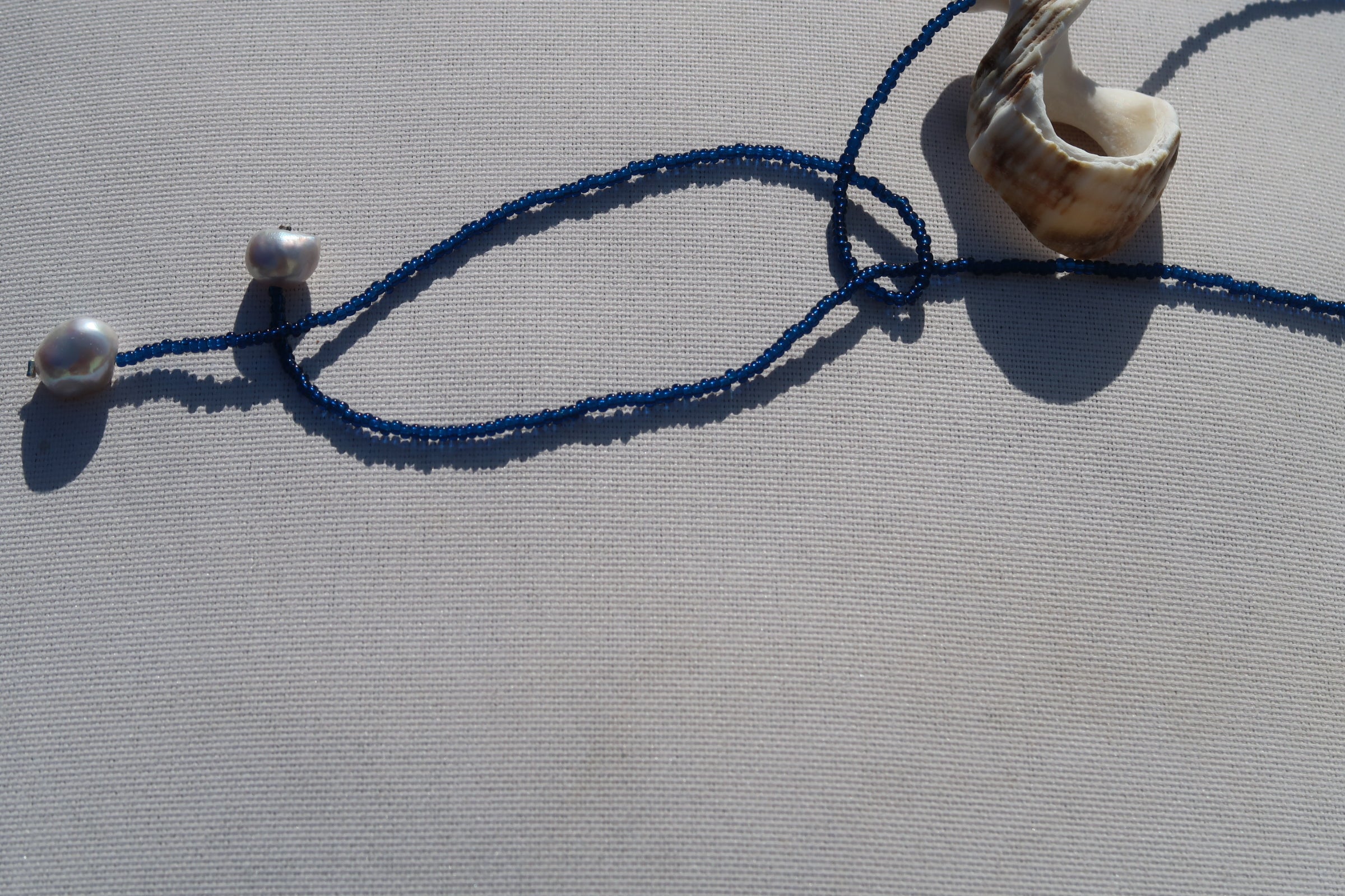 Blue and pearl necklace